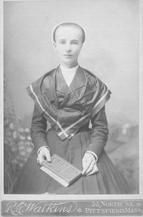 SA0017 - A three-quarter length studio portrait. Caption on the back says Lucy Bowers was in New Lebanon, 1867; Enfield,1896; and Watervliet,1917., Winterthur Shaker Photograph and Post Card Collection 1851 to 1921c